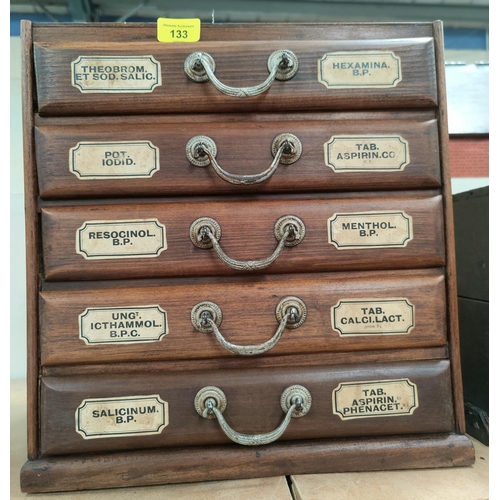 133 - An early 20th century medical metal 5 drawer cabinet with drug labels to front and sides