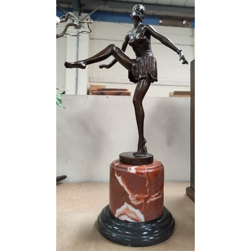 140A - An Art Deco style bronze of semi clad woman dancing, back signed D Alonzo with plaque, on marble pli... 