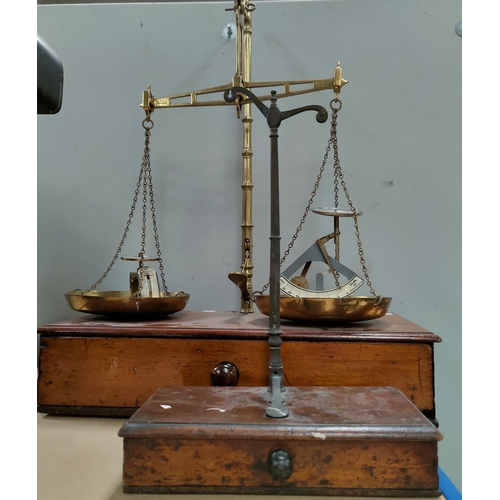 141C - A brass set of weighing scales by De Garve, other various sets of scales