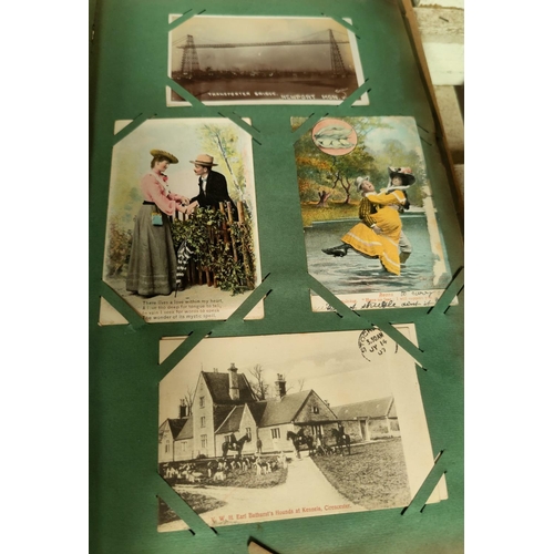 188 - An Edwardian postcard album containing 140+ cards