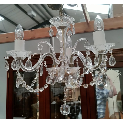 29 - An antique crystal chandelier of 3 branches