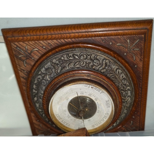 4 - A carved wooden aneroid barometer and a selection of collectables