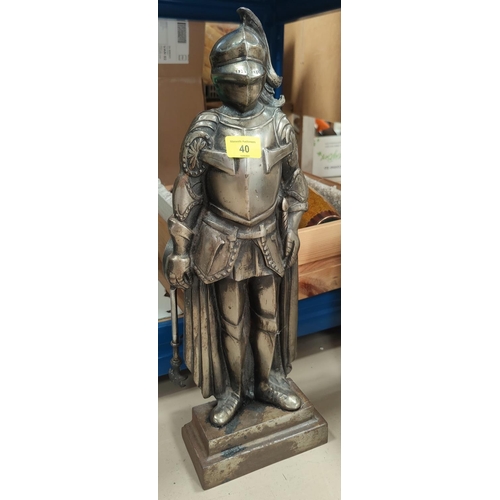 40 - A polished steel companion set 'knight in armour'