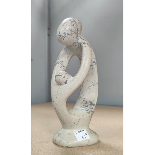 45G - A Stoneware sculpture in the manor of Henry Moore, parent and child height 10cm