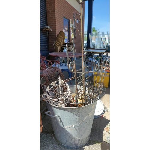 47A - A zinc plated covered bin and various wrought iron plant holders