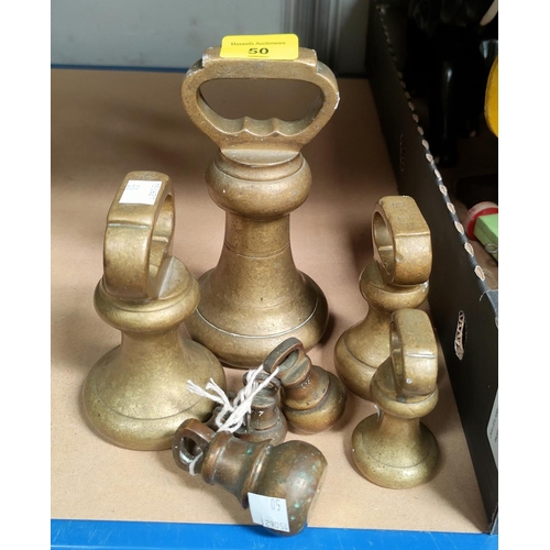 50 - A graduating matched part set of butcher's bell weights