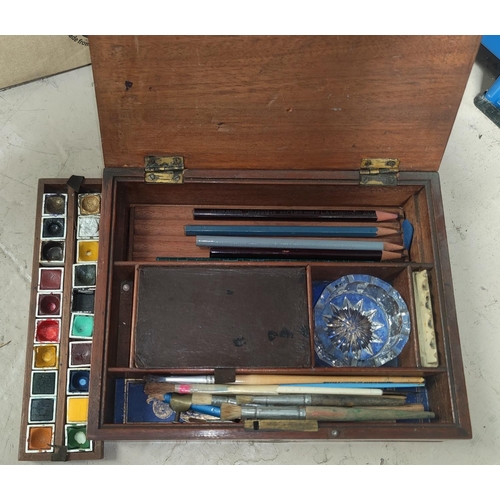 55 - A 19th century artist's mahogany colour box, the ceramic palette marked Winsor and Newton, 23 cm