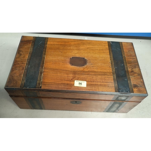 56 - A Victorian walnut writing box outfolding to slope, 45 cm