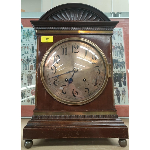 57 - An early 20th century mantel clock in mahogany case, brass dial, 8 day striking movement, height 44 ... 