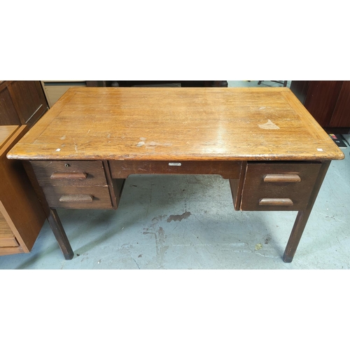 641 - A large vintage oak W.H.Priest and Sons teachers desk with rectangular rounded top, three drawers on... 
