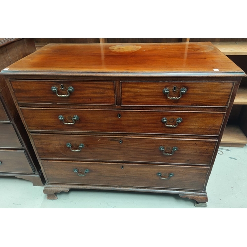 660 - A Georgian mahogany chest of three long and two short drawers on ogee bracket feet length 110cm x he... 