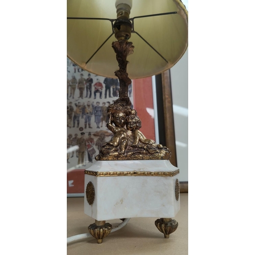 67 - A classical style table lamp in gilt metal and marble, with green silk shade, overall height 60 cm