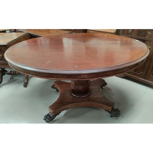 676 - A 19th century mahogany oval tilt top breakfast table, on pedestal column on lion's paw feet length ... 