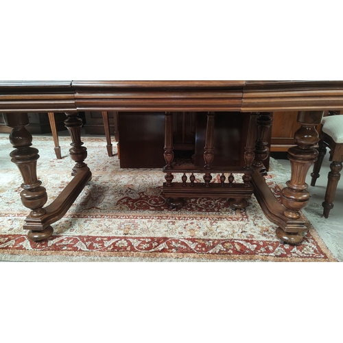 728 - A late 19th century French provincial walnut extending dining table, on turned and fluted legs, 3 sp... 