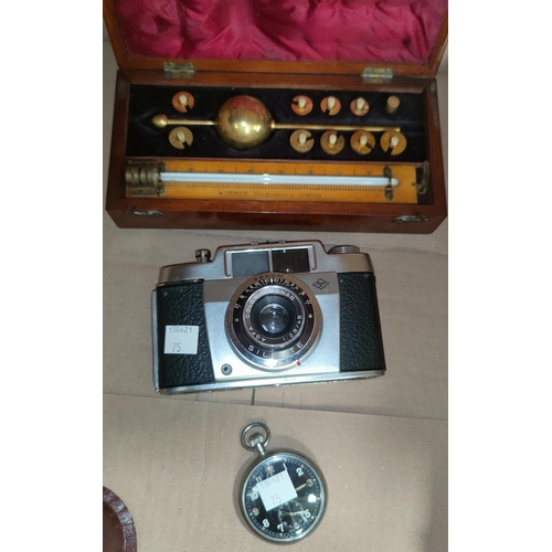 75 - A Sikes hydrometer, mahogany case; a ministry issue pocket watch by Cyma; a camera