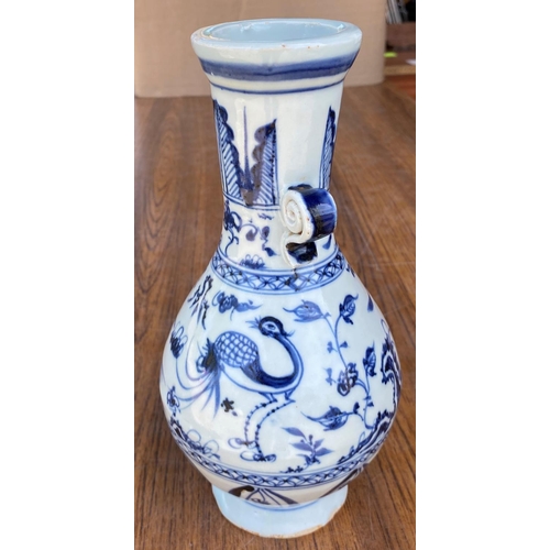 470 - A Chinese blue and white baluster vase with bird decoration height 24cm