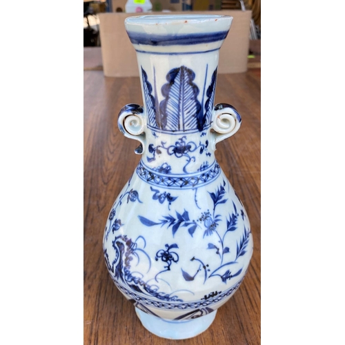 470 - A Chinese blue and white baluster vase with bird decoration height 24cm