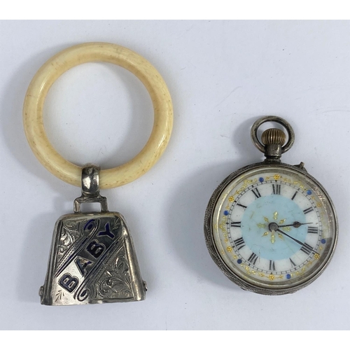 505 - A baby's teething ring with silver bell attached, marked 'BABY' in blue enamel, Birmingham 1902 and ... 