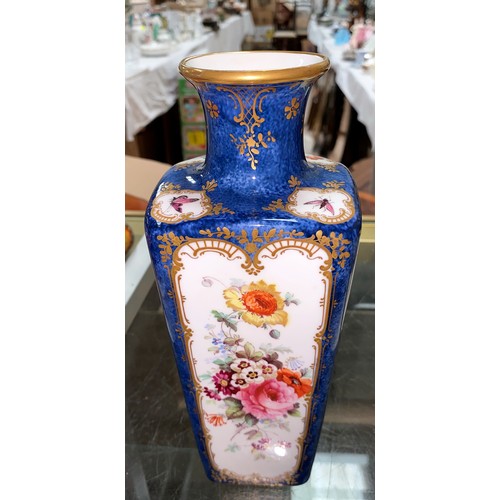 375A - A Sevres style handpainted porcelain vase with blue background, polychrome panels of birds and flowe... 