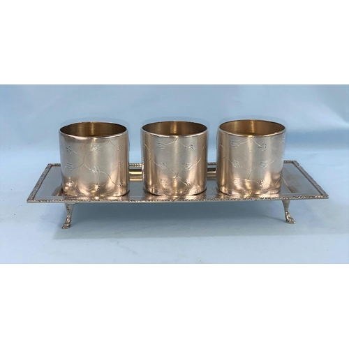 571 - American Sterling Silver Set 3 Vodka Whiskey Wine Cups & Tray Fine Chased C1930.  (A rectangular whi... 