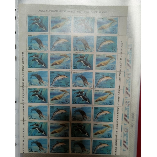 209 - A selection of various world stamps, part sheets