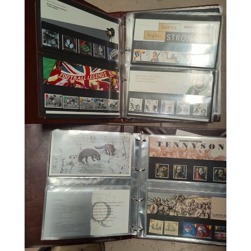 272 - GB: a collection of 50+ presentation packs of commemorative stamps, in an album 1996-2000, and anoth... 