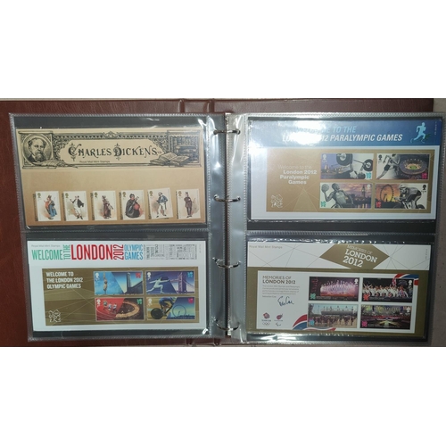 274 - GB: a collection of 80+ presentation packs of commemorative stamps, in an album, mainly 2012 includi... 