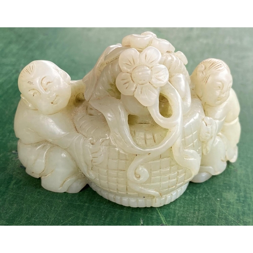 467 - A Chinese jade coloured hardstone group of a young girl and boy with central basket of flowers lengt... 