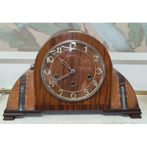 142 - A stylish Art Deco walnut mantel clock with inlaid decoration and chrome mounts (with pendulum and k... 
