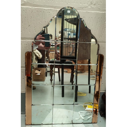 627 - A tall Art Deco mirror made up of tile mirror squares in the central section, with peach colour edgi... 