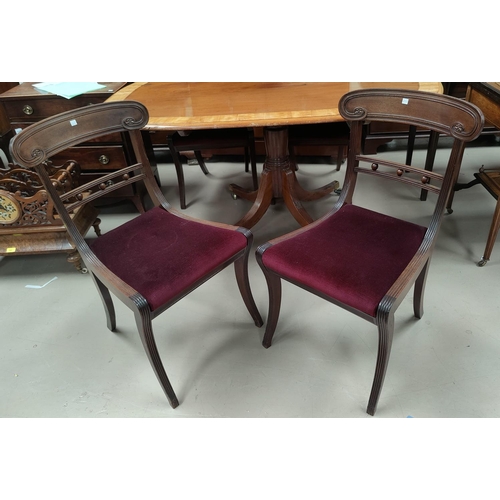 647 - A set of 4 19th century Regency style mahogany dining chairs with deep red seats on reeded legs and ... 