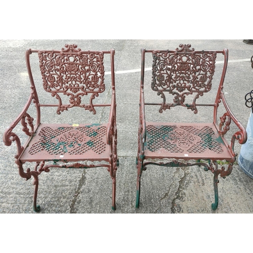 659 - A pair of Victorian style unusual cast metal garden arm chairs