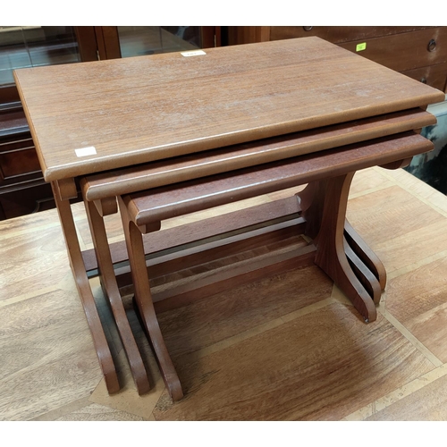 683 - A mid 20th century nest of three occasional tables