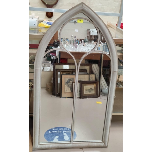 717 - A Gothic style garden mirror, 114 cm