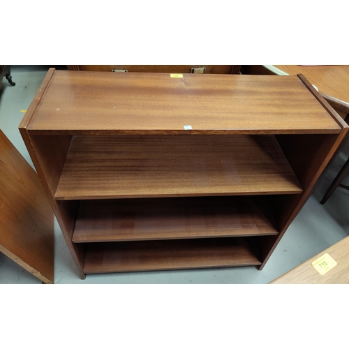 723 - A teak 3 height bookcase; an occasional table/whatnot; a mahogany nest of 3 occasional tables