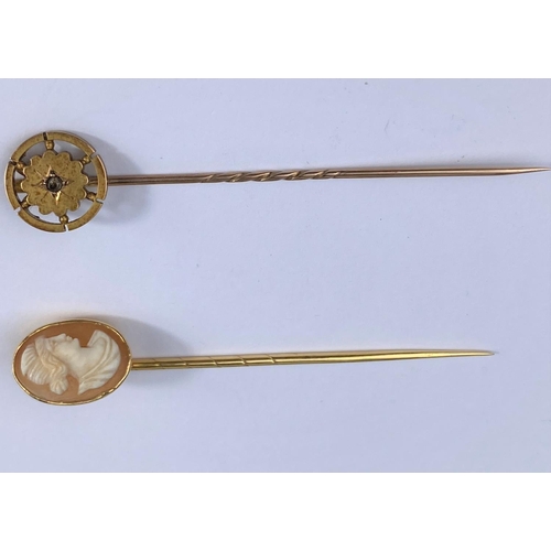 501 - A cameo female head stick pin and another with circular flowerhead design set with diamond chip, bot... 