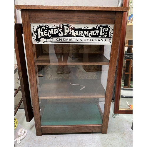 780 - An early 20th century counter top shop display cabinet marked 'Kemp's Pharmacy, Chemists and Opticic... 