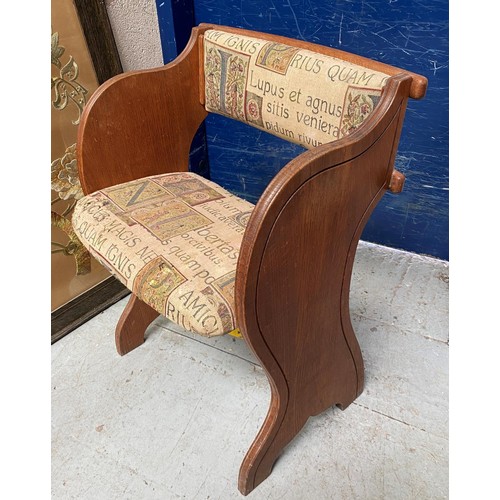 651 - A  monastic style chair with later upholstery