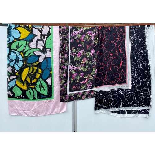 207 - An ESCADA large silk square scarf, pink ground with green, black, yellow and turquoise pattern, anot... 