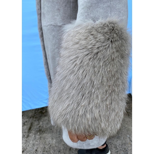 216 - An ESCADA pale grey shearling lambs wool full length coat with grey fox fur collar and deep cuffs, s... 