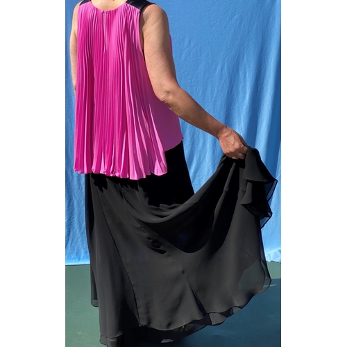 219 - A Joseph Ribkoff black heavy jersey sleeveless dress with cerise floral panel to the front with wire... 
