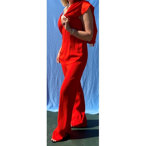 221 - A Marccain bright orange 2 piece evening trouser suit , (size 14) with original tags; a Marccain bla... 