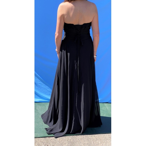 231 - ESCADA - a black evening dress with single broad shoulder strap, side split, size 12; a Milano Forma... 