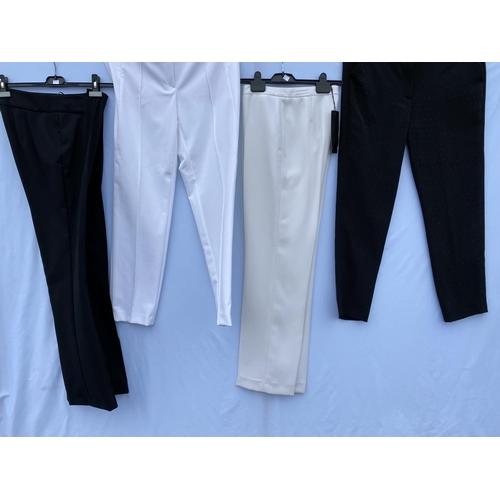 273 - Four pair of Escada trousers - black size 38, white size 38 with tags, cream size 40, black evening ... 