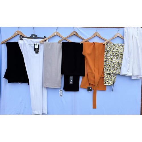 274 - A mixed lot - Escada cotton trousers with lemon patter, size 40, with tags; Basler - black trousers,... 