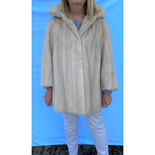 279 - A honey colour 3/4 length mink coat