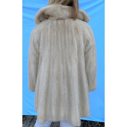 279 - A honey colour 3/4 length mink coat