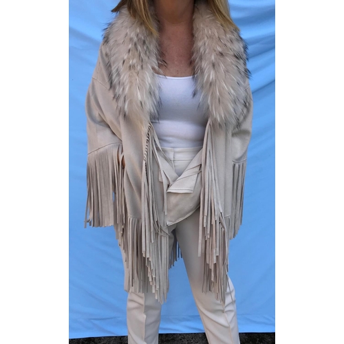 280 - A fan cape with pockets, long tasselled fringing and detachable silver fox fur collar