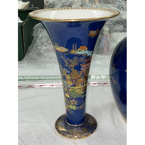 365 - A 1930's Carltonware garniture in blue lustre with chinoiserie scenes comprising 2 trumpet shaped va... 