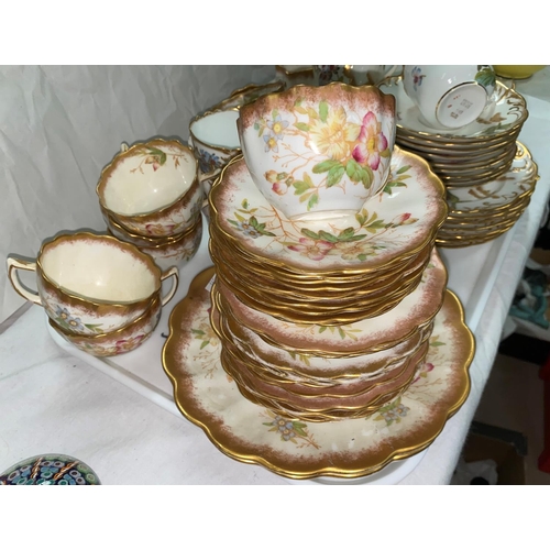 391 - Two early 20th century floral part tea sets with gilt borders